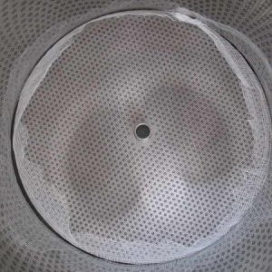 Cheesecloth wrapped around ss filter and steel plate.