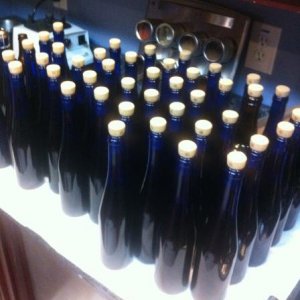 I got a hold of some beautiful 375 ml cobalt blue bottles and decided to use belgian corks and wire hoods.