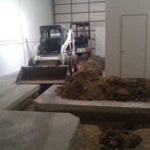 diging up the brewery space for floor drains