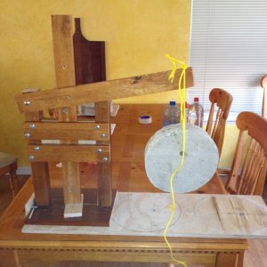 Weight test cheese press with 23 pounds of concrete to check the structural inegrity